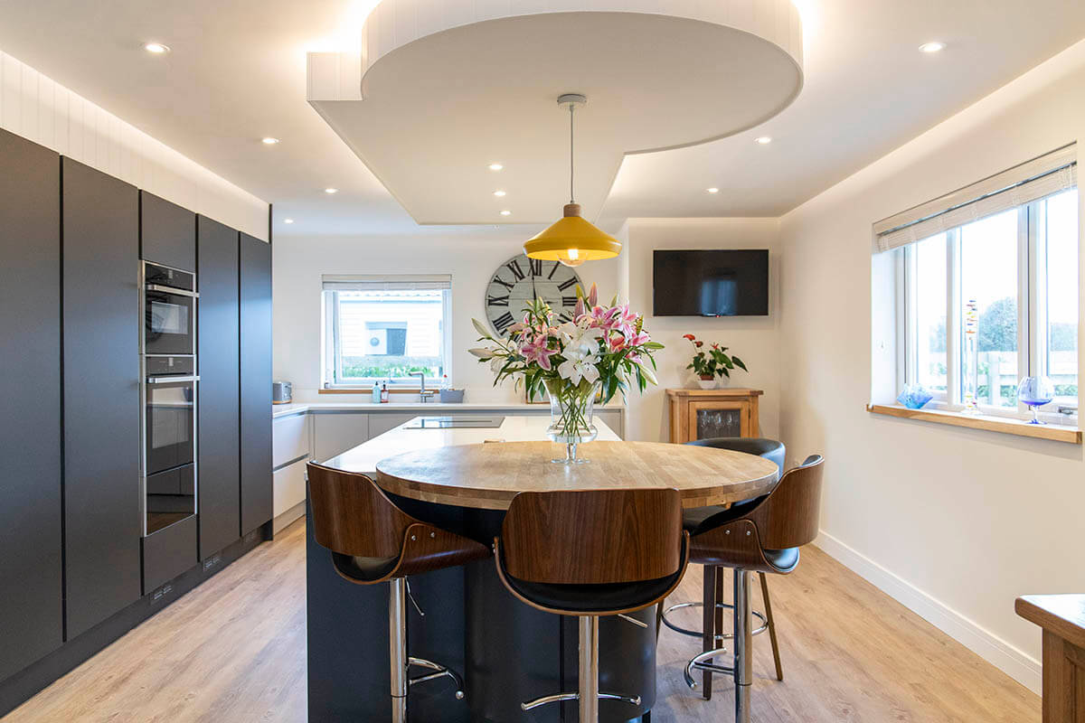 Past Projects: Sleek Kitchen with Oak Disc Island