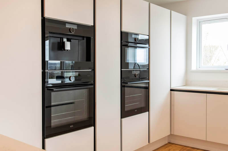 The floor to ceiling larder unit house two integrated ovens